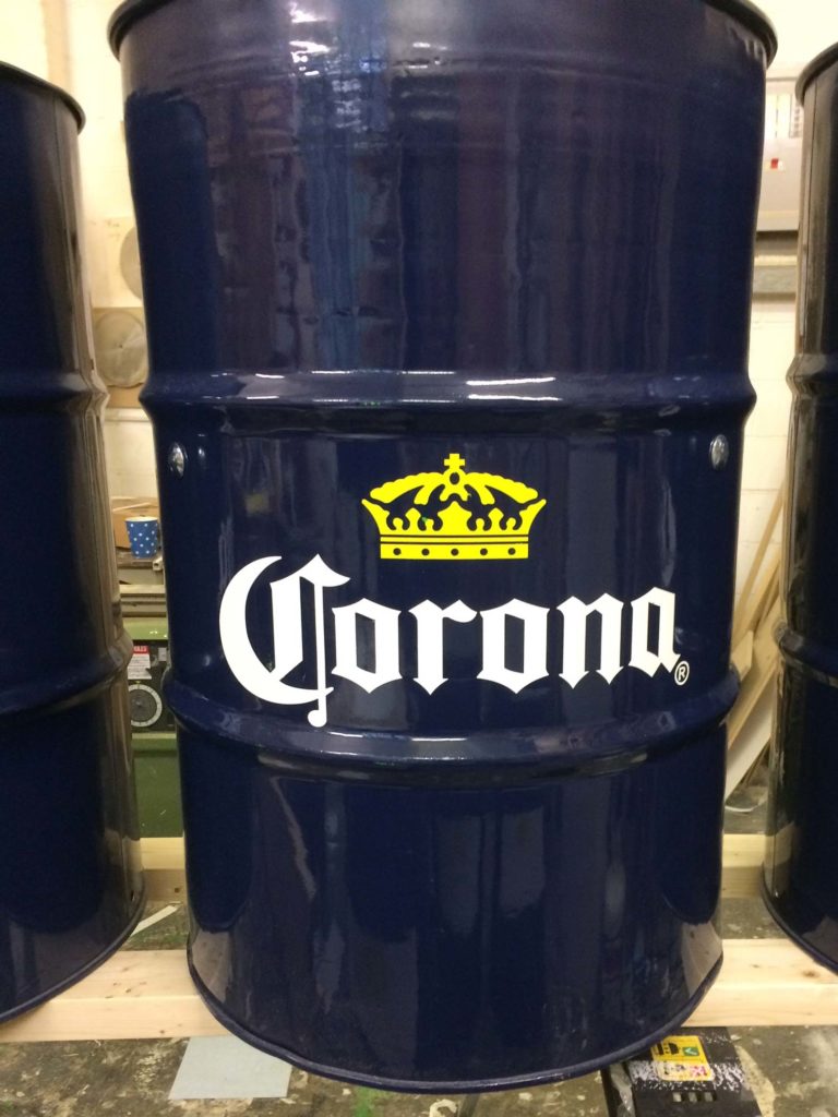 Corona Stencilling on Beer Drums